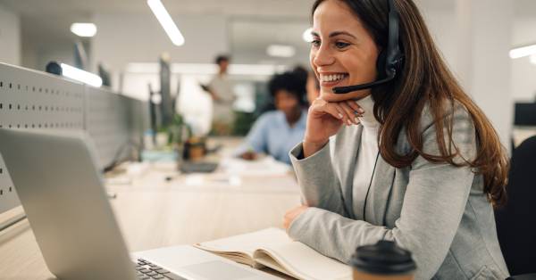 Customer agent smiling.